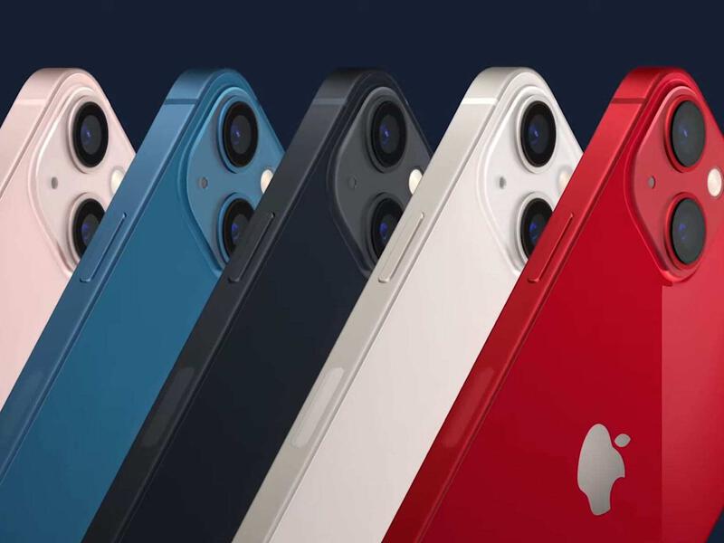 iPhone 13 models displayed in five different color options: pink, blue, midnight, starlight, and (PRODUCT)RED