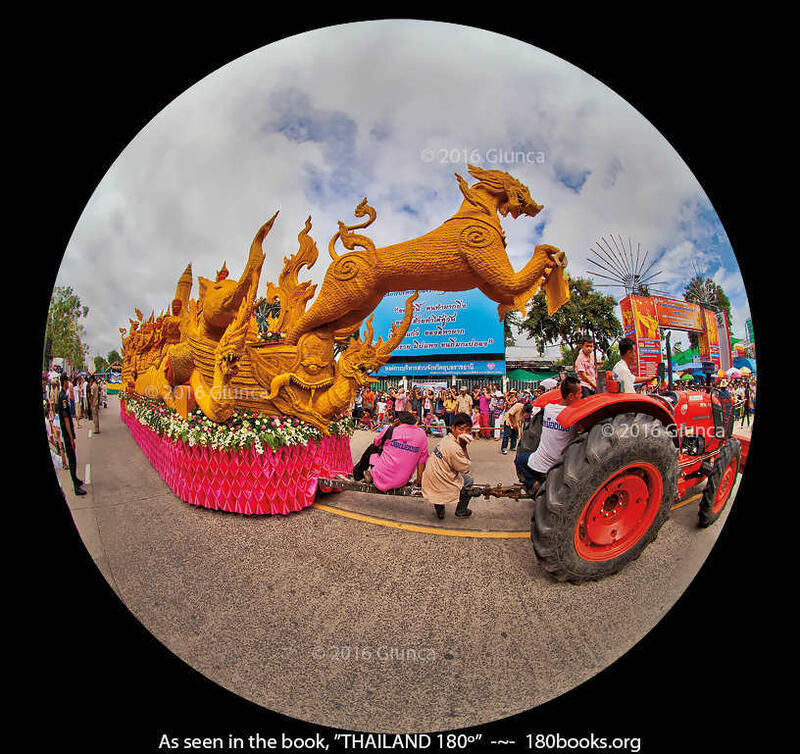 A detailed float with mythical wax sculptures in the Ubon Ratchathani Candle Festival parade, Thailand